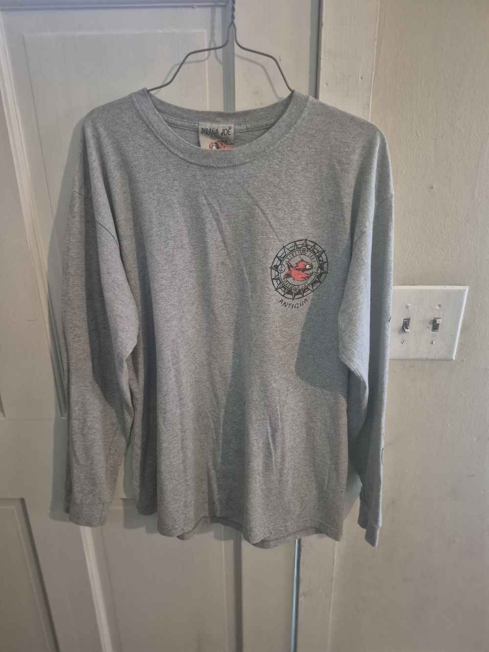 Men's Long Sleeve Gray Graphic Tee with Small Chest Emblem
